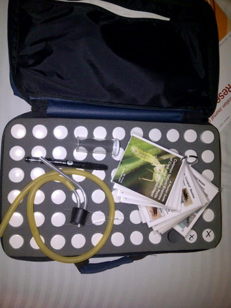Entomologist’s kit with small vials and an aspirator
