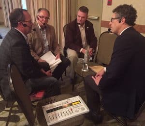 Recording the podcast live at Canola Discovery Forum. Credit: Rick Taillieu