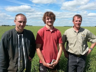 Franck Groeneweg on the right is the Edgeley grower managing the plots. The two other men are agriculture exchange students from France.