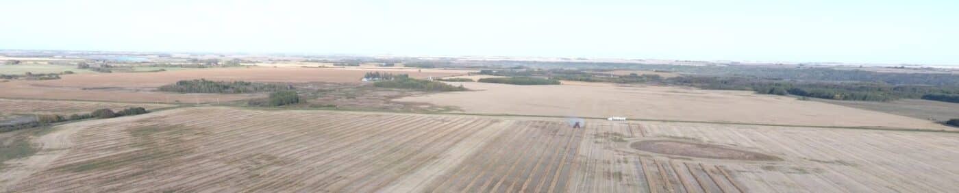 Harvesting on-farm field scale canola trials in fall